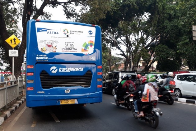 Foto - Semarakkan Asian Games 2018, 60 Unit Bus Transjakarta Kini Berstiker Astra International